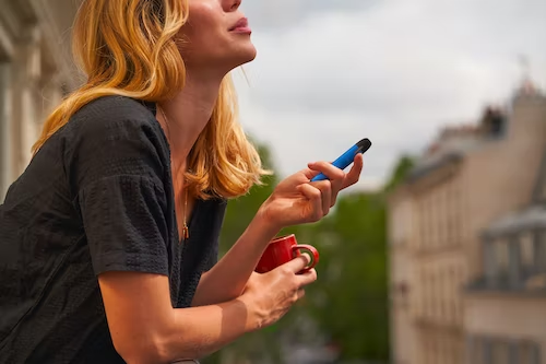 Person using a vape.